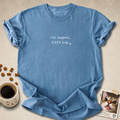 Blue Jean colored Comfort Colors 1717 cotton T-shirt, featuring a "Life happens, cats help" funny cat design illustration. One Meow Two Souls brand.