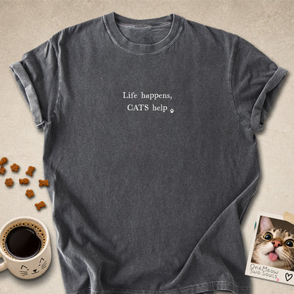 Pepper colored Comfort Colors 1717 cotton T-shirt, featuring a "Life happens, cats help" funny cat design illustration. One Meow Two Souls brand.