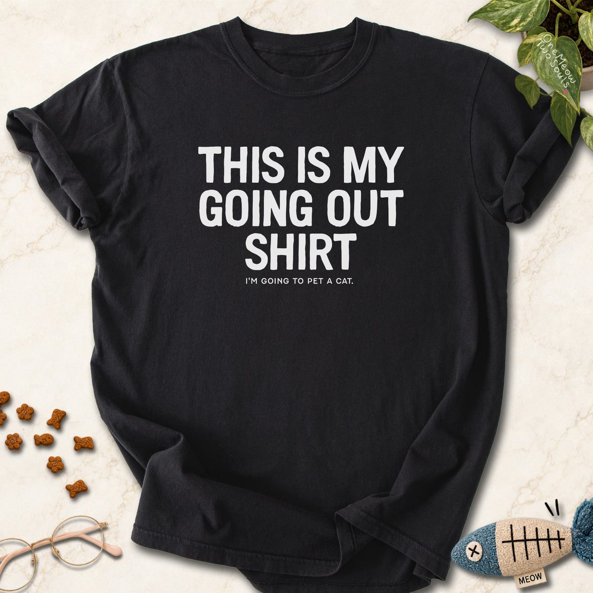Black colored Comfort Colors 1717 cotton T-shirt, featuring a "This Is My Going Out Shirt. I Am Going To Pet A Cat" funny cat design illustration. One Meow Two Souls brand.