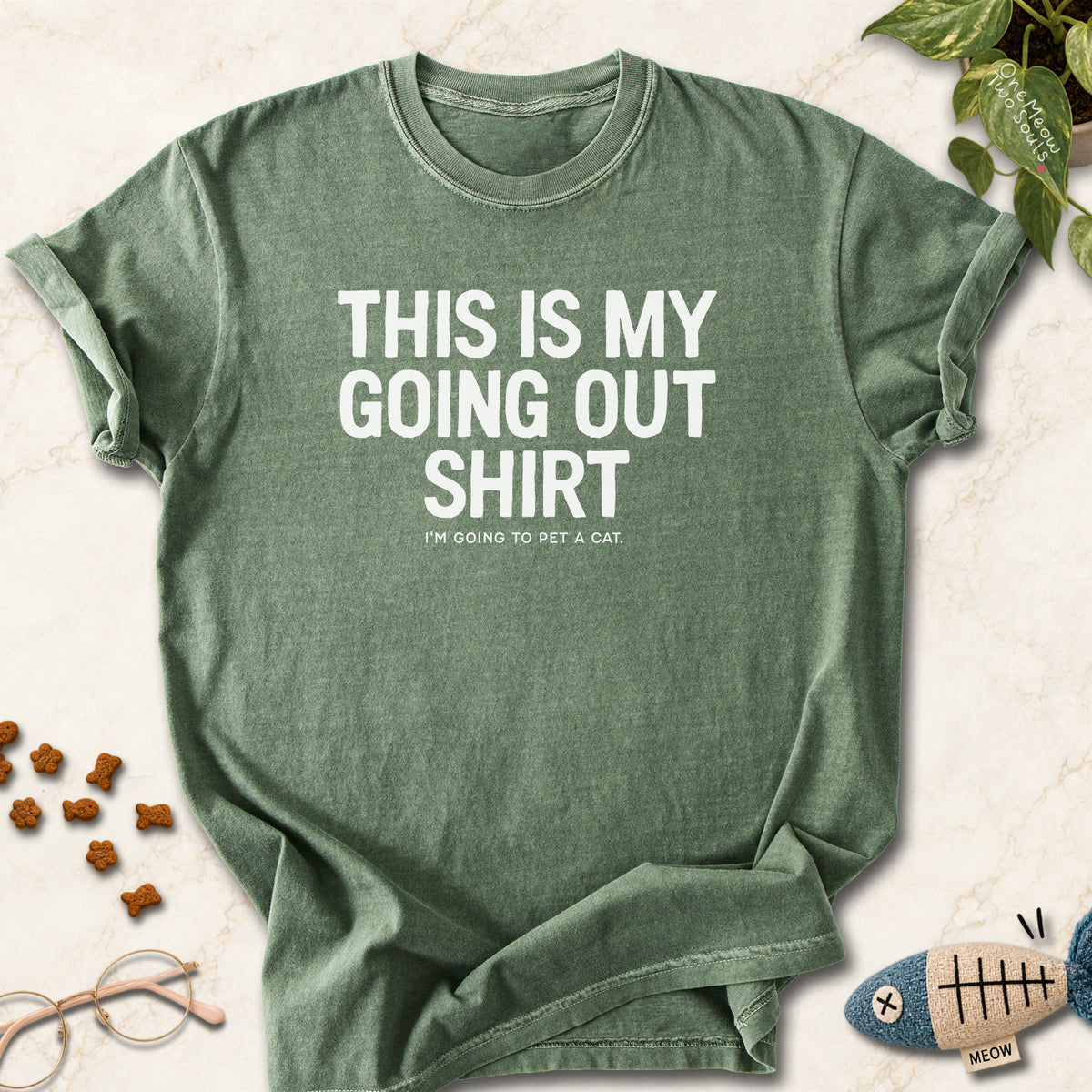 Moss colored Comfort Colors 1717 cotton T-shirt, featuring a "This Is My Going Out Shirt. I Am Going To Pet A Cat" funny cat design illustration. One Meow Two Souls brand.