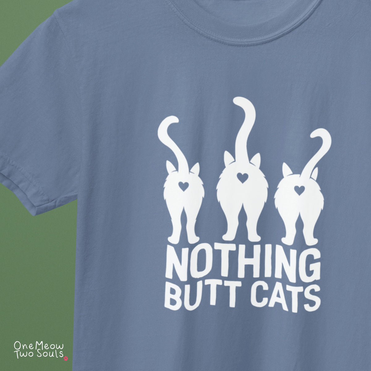 Blue jean colored Comfort Colors 1717 cotton T-shirt, featuring a "Nothing Butt Cats" funny cat design illustration. One Meow Two Souls brand.