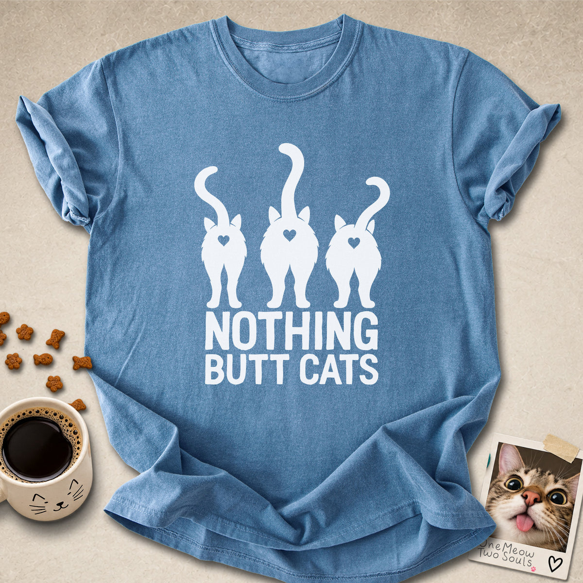 Blue jean colored Comfort Colors 1717 cotton T-shirt, featuring a "Nothing Butt Cats" funny cat design illustration. One Meow Two Souls brand.