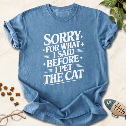 Blue Jean colored Comfort Colors 1717 cotton T-shirt, featuring a "Sorry for what I said before I pet the cat" funny cat design illustration. One Meow Two Souls brand.
