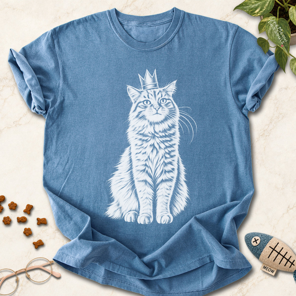 Blue jean colored Comfort Colors 1717 cotton T-shirt, featuring a royal king cat design illustration. One Meow Two Souls brand.