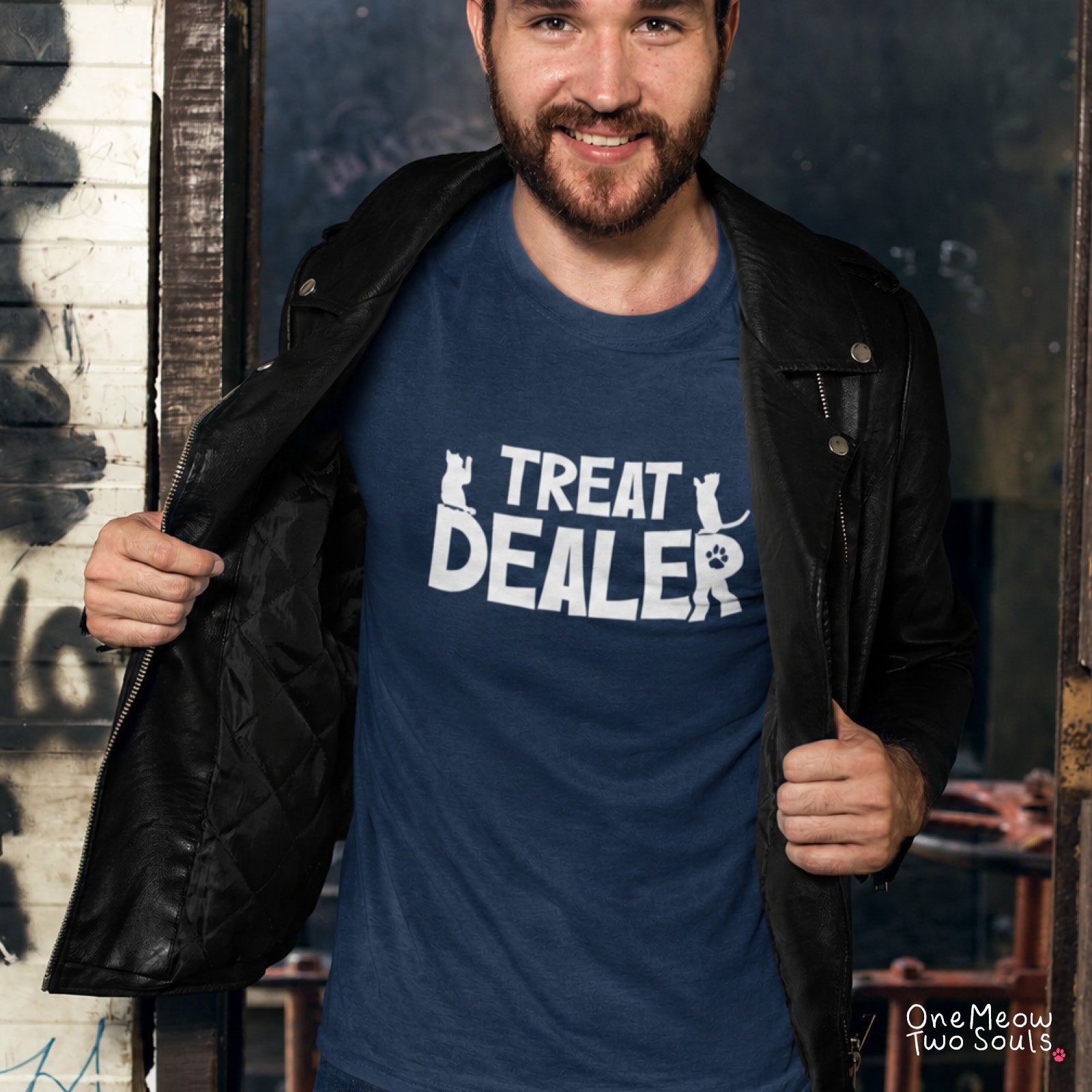 Navy colored Comfort Colors 1717 cotton T-shirt, featuring a "Treat Dealer" funny cat design illustration. One Meow Two Souls brand.