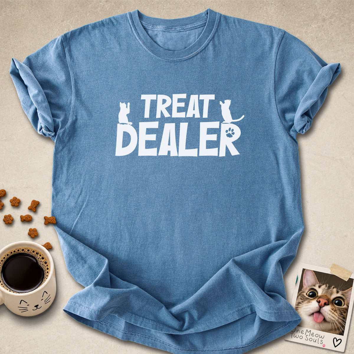 Blue jean  colored Comfort Colors 1717 cotton T-shirt, featuring a "Treat Dealer" funny cat design illustration. One Meow Two Souls brand.