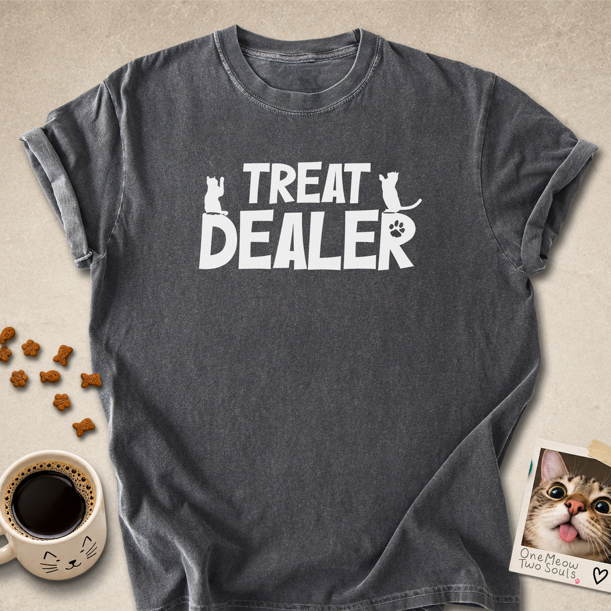 Pepper colored Comfort Colors 1717 cotton T-shirt, featuring a "Treat Dealer" funny cat design illustration. One Meow Two Souls brand.