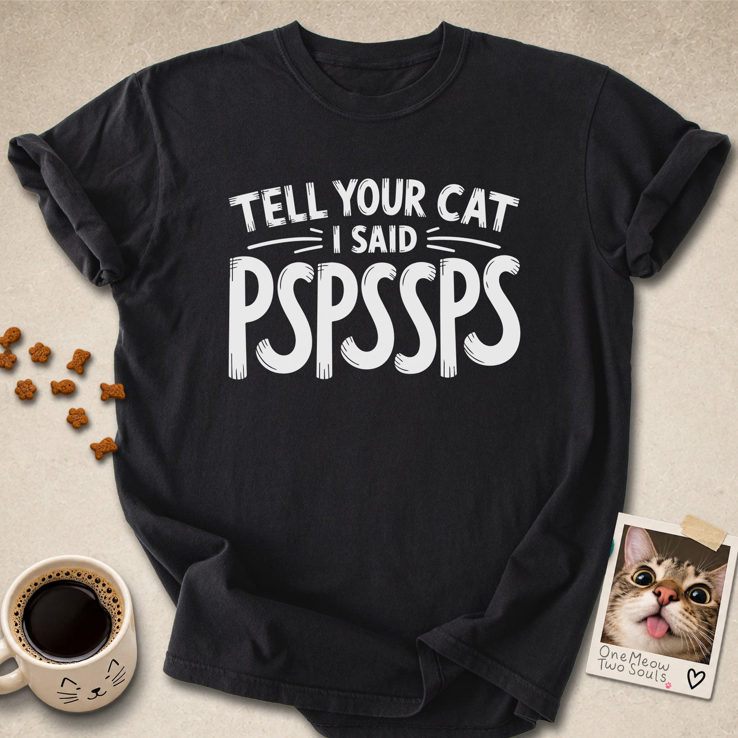 Black colored Comfort Colors 1717 cotton T-shirt, featuring a "Tell your cat I said Pspssps" funny cat design illustration. One Meow Two Souls brand.