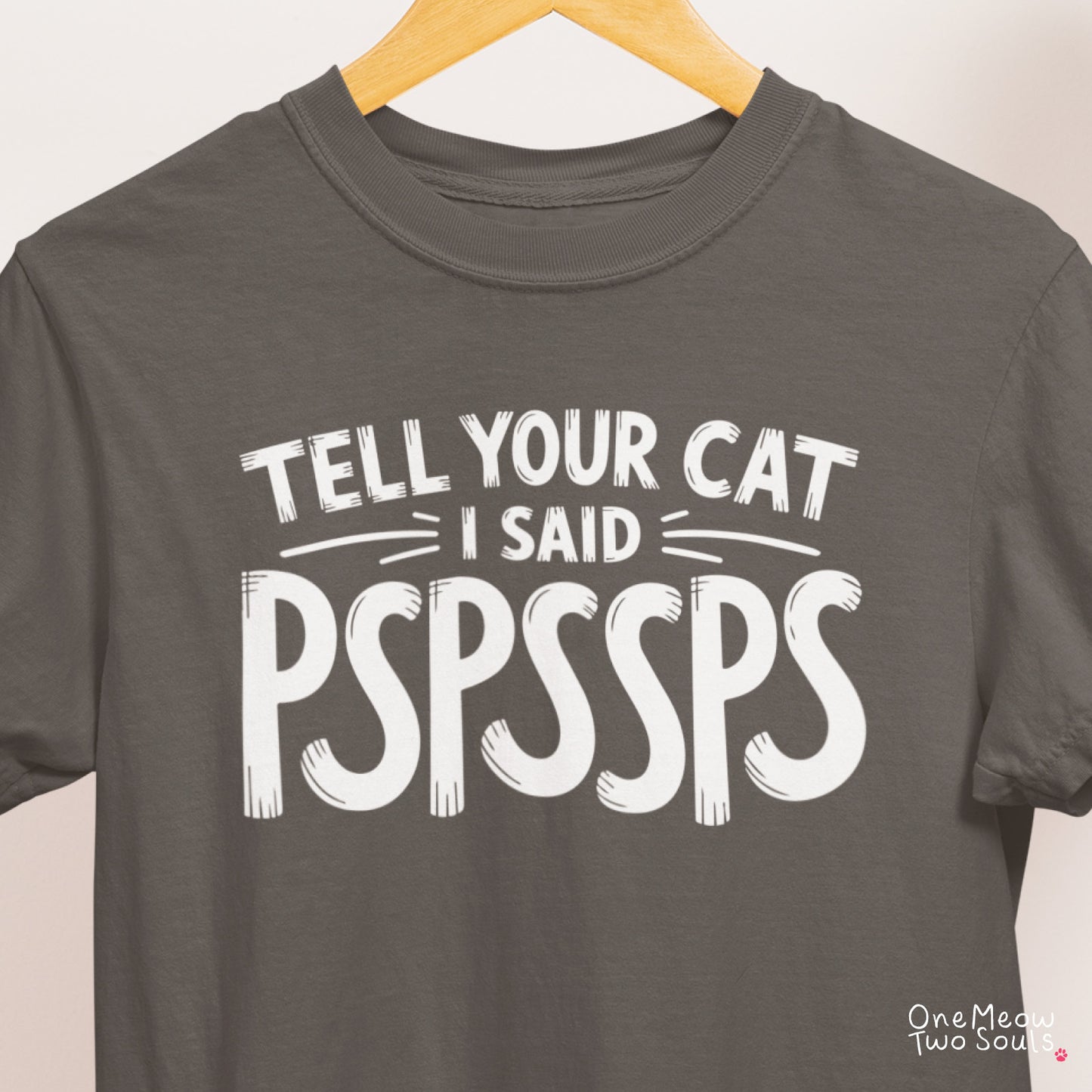 Pepper colored Comfort Colors 1717 cotton T-shirt, featuring a "Tell your cat I said Pspssps" funny cat design illustration. One Meow Two Souls brand.