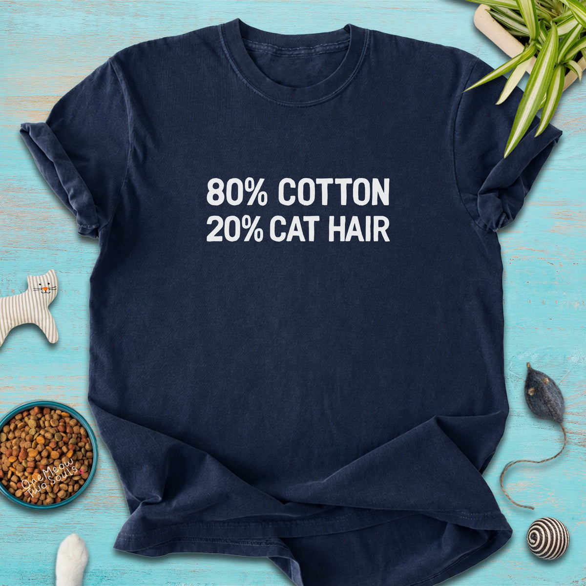Navy Color Comfort Colors 1717 t-shirt with a "80% cotton 20% cat hair" design. One Meow Two Souls brand.