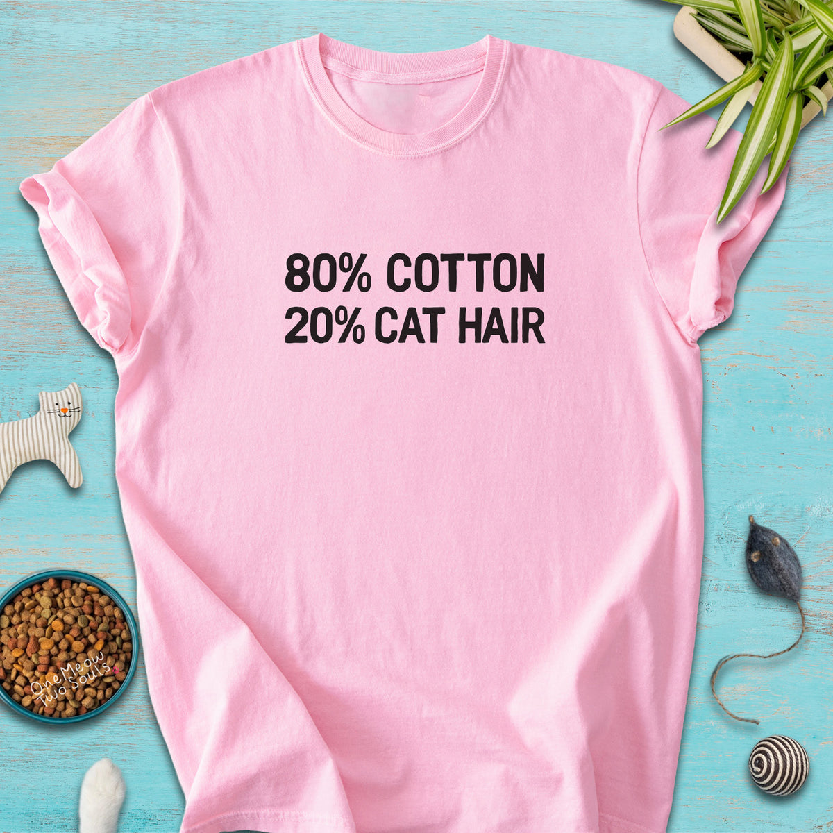 Blossom colored Comfort Colors 1717 t-shirt with a "80% cotton 20% cat hair" design. One Meow Two Souls brand.