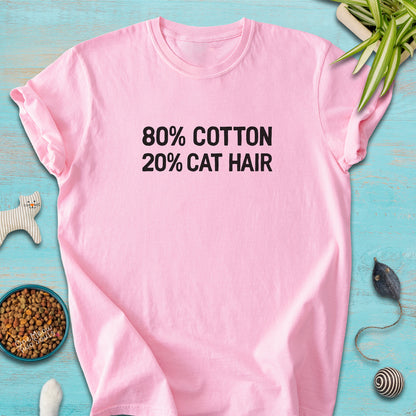 Blossom colored Comfort Colors 1717 t-shirt with a "80% cotton 20% cat hair" design. One Meow Two Souls brand.