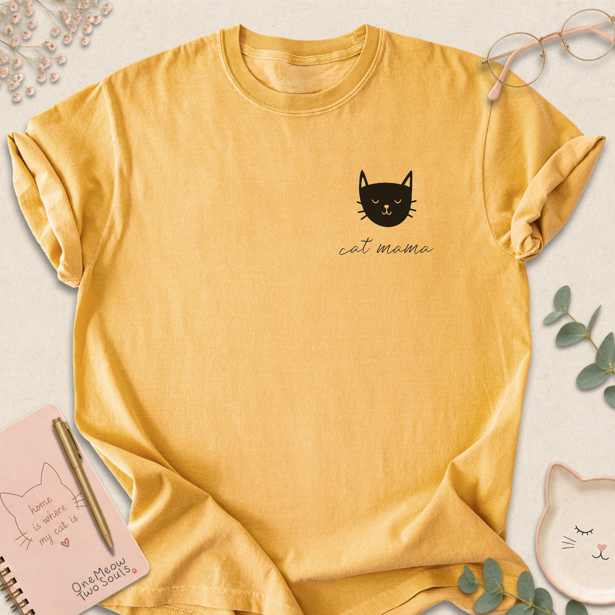 Mustard colored Comfort Colors 1717 cotton T-shirt, featuring a "Cat Mama" funny cat design illustration. One Meow Two Souls brand.