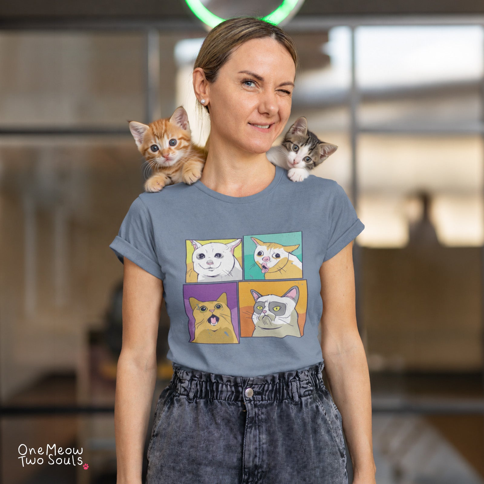 Blue Jean colored Comfort Colors 1717 cotton T-short featuring a colorful Cat Meme faces design. One Meow Two Souls brand.