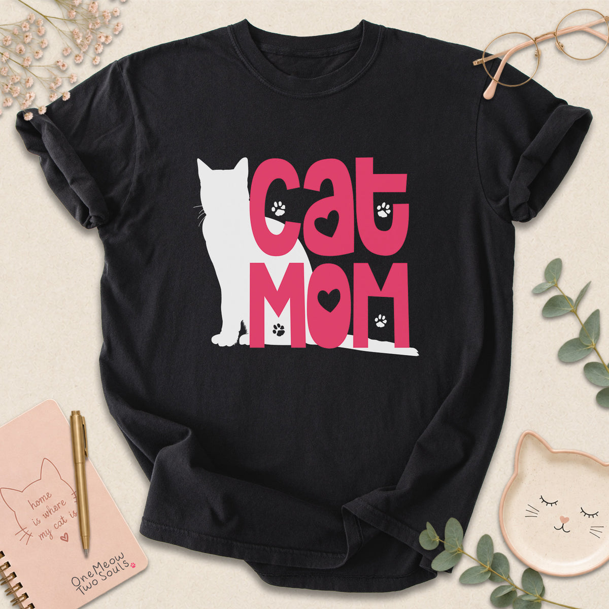 Black colored Comfort Colors 1717 cotton T-shirt, featuring a "Cat Mom" funny cat design illustration. One Meow Two Souls brand.