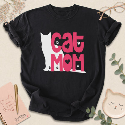 Black colored Comfort Colors 1717 cotton T-shirt, featuring a "Cat Mom" funny cat design illustration. One Meow Two Souls brand.