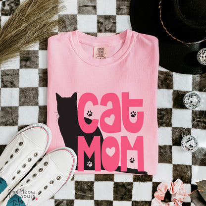 Blossom colored Comfort Colors 1717 cotton T-shirt, featuring a "Cat Mom" funny cat design illustration. One Meow Two Souls brand.