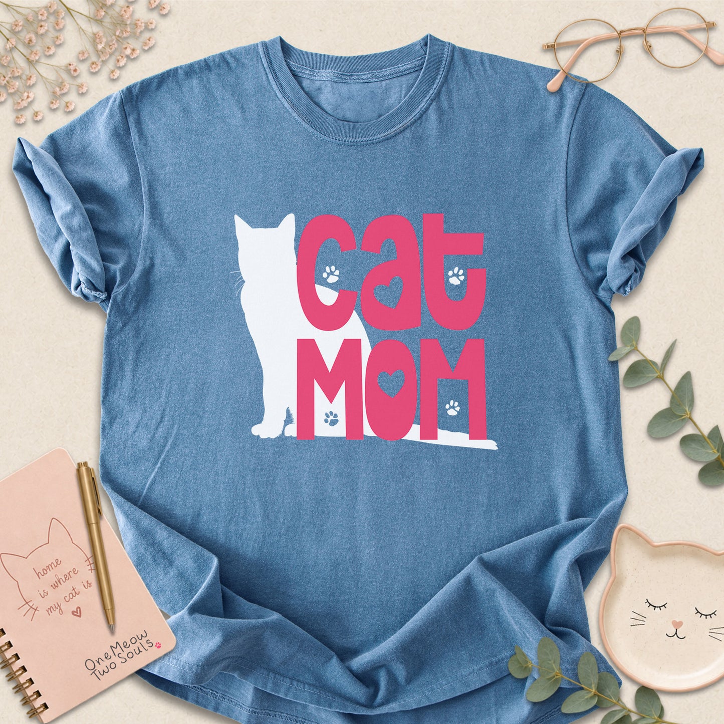 Blue jean colored Comfort Colors 1717 cotton T-shirt, featuring a "Cat Mom" funny cat design illustration. One Meow Two Souls brand.