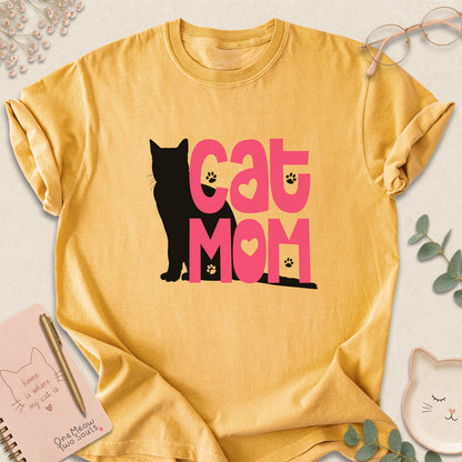 Mustard colored Comfort Colors 1717 cotton T-shirt, featuring a "Cat Mom" funny cat design illustration. One Meow Two Souls brand.