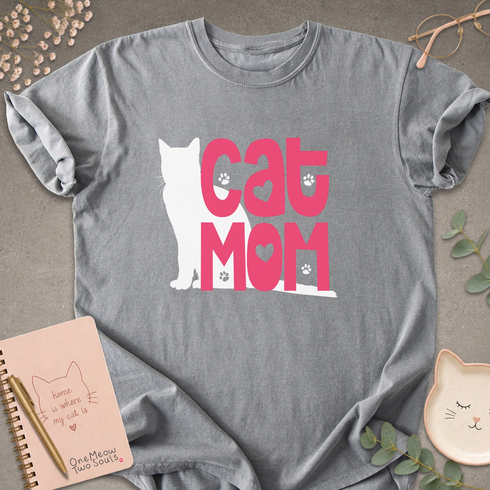 Grey colored Comfort Colors 1717 cotton T-shirt, featuring a "Cat Mom" funny cat design illustration. One Meow Two Souls brand.