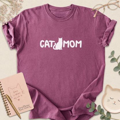 Berry Comfort Colors 1717 t-shirt with a white graphic reading 'CAT MOM'. One Meow Two Souls brand.