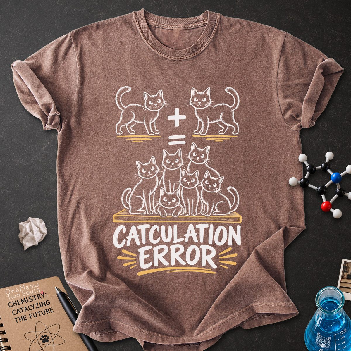 Espresso colored Comfort Colors 1717 cotton T-shirt, featuring a "Catculation Error" funny cat design illustration. One Meow Two Souls brand.