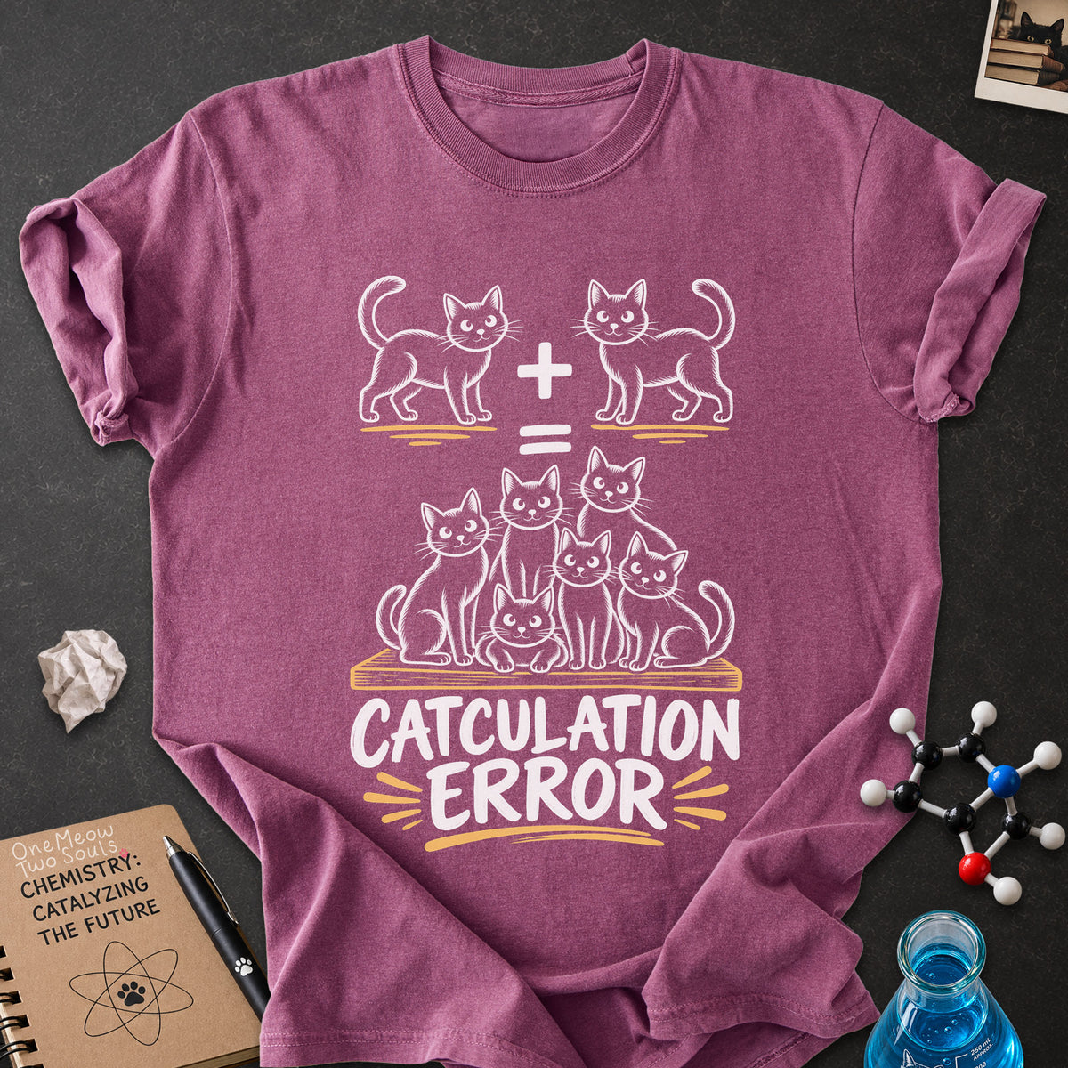Berry colored Comfort Colors 1717 cotton T-shirt, featuring a "Catculation Error" funny cat design illustration. One Meow Two Souls brand.