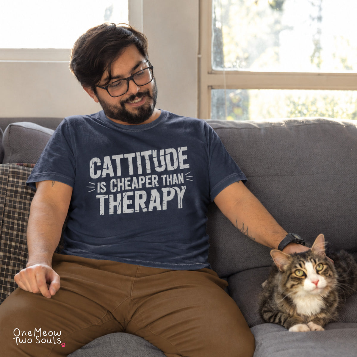 Navy colored Comfort Colors 1717 cotton T-shirt, featuring a "Cattitude Is Cheaper Than Therapy" funny cat design illustration. One Meow Two Souls brand.
