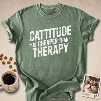 Moss colored Comfort Colors 1717 cotton T-shirt, featuring a "Cattitude Is Cheaper Than Therapy" funny cat design illustration. One Meow Two Souls brand.