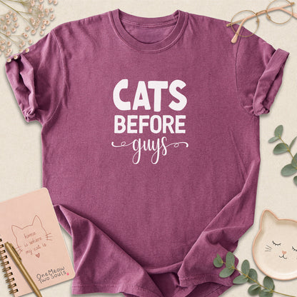Berry colored Comfort Colors 1717 cotton T-shirt, featuring a "Cats Before Guys" funny cat design illustration. One Meow Two Souls brand.