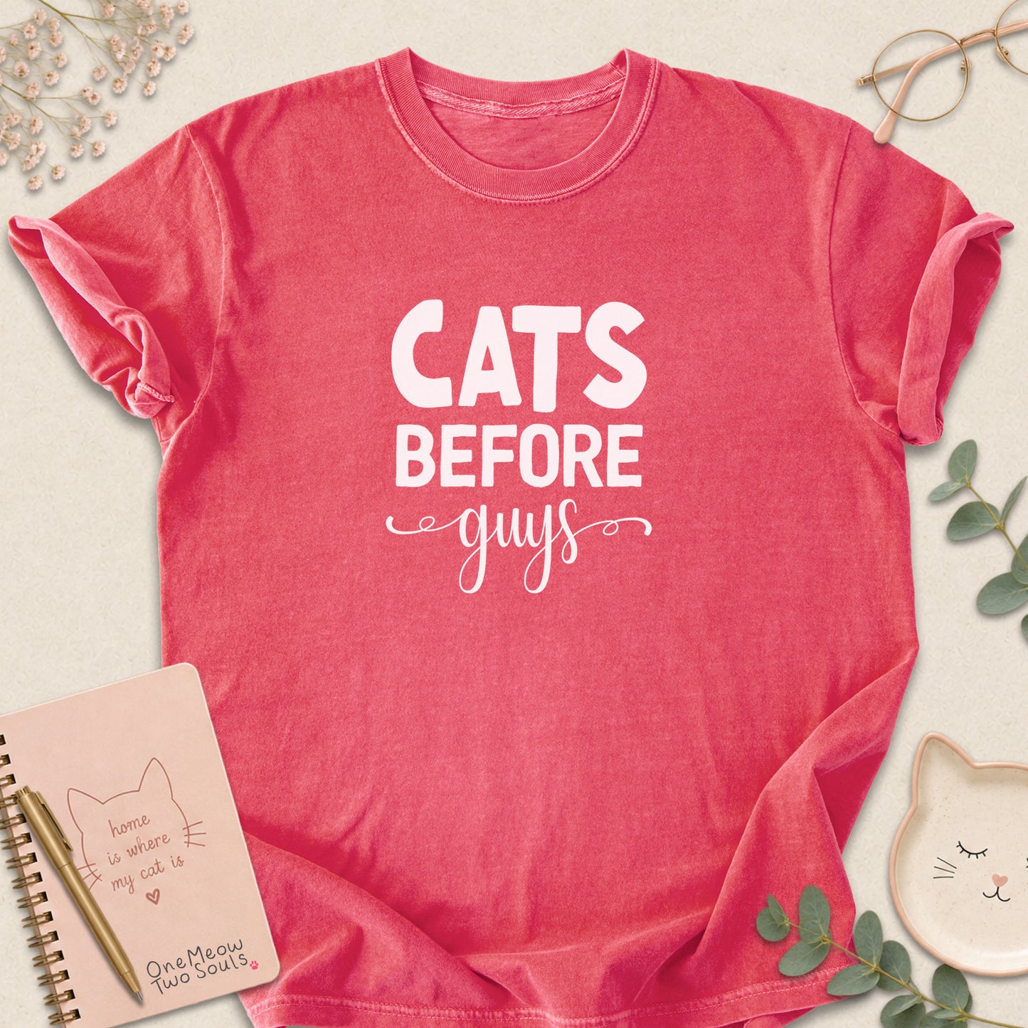 Watermelon colored Comfort Colors 1717 cotton T-shirt, featuring a "Cats Before Guys" funny cat design illustration. One Meow Two Souls brand.
