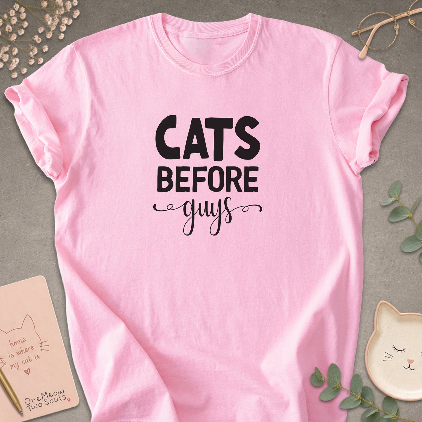 Blossom colored Comfort Colors 1717 cotton T-shirt, featuring a "Cats Before Guys" funny cat design illustration. One Meow Two Souls brand.