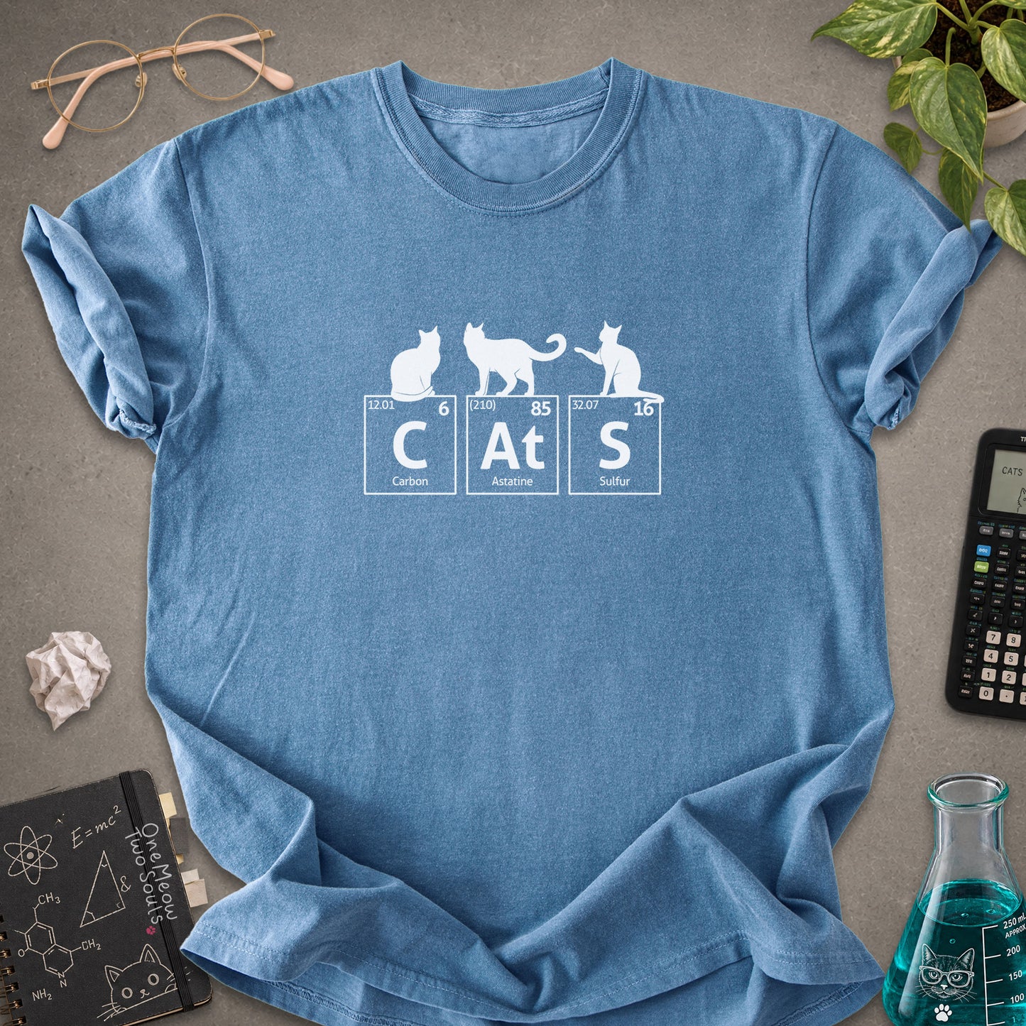 Blue Jean colored Comfort Colors 1717 cotton T-shirt, presenting a "CatS" funny chemistry periodic table cat design. One Meow Two Souls brand.