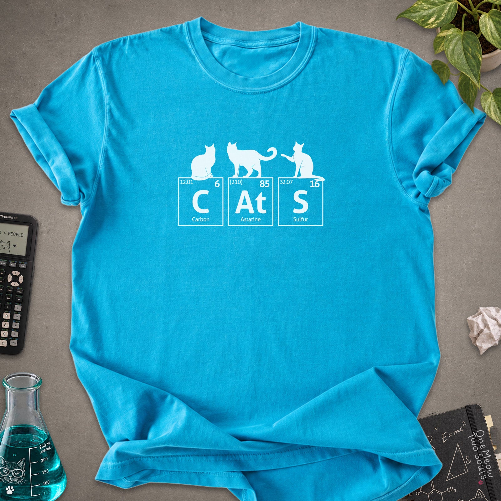 Sapphire colored Comfort Colors 1717 cotton T-shirt, presenting a "CatS" funny chemistry periodic table cat design. One Meow Two Souls brand.
