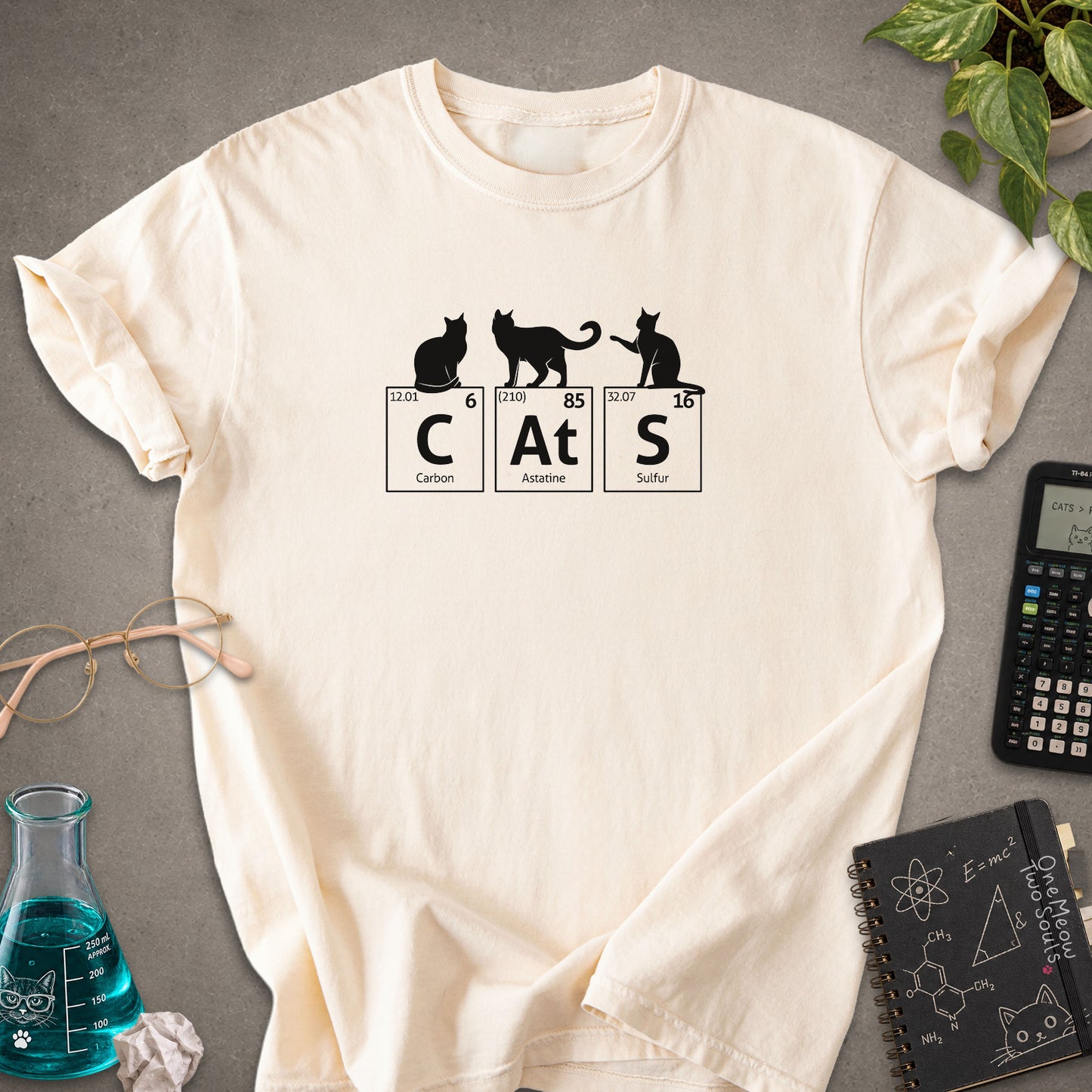 Ivory colored Comfort Colors 1717 cotton T-shirt, presenting a "CatS" funny chemistry periodic table cat design. One Meow Two Souls brand.