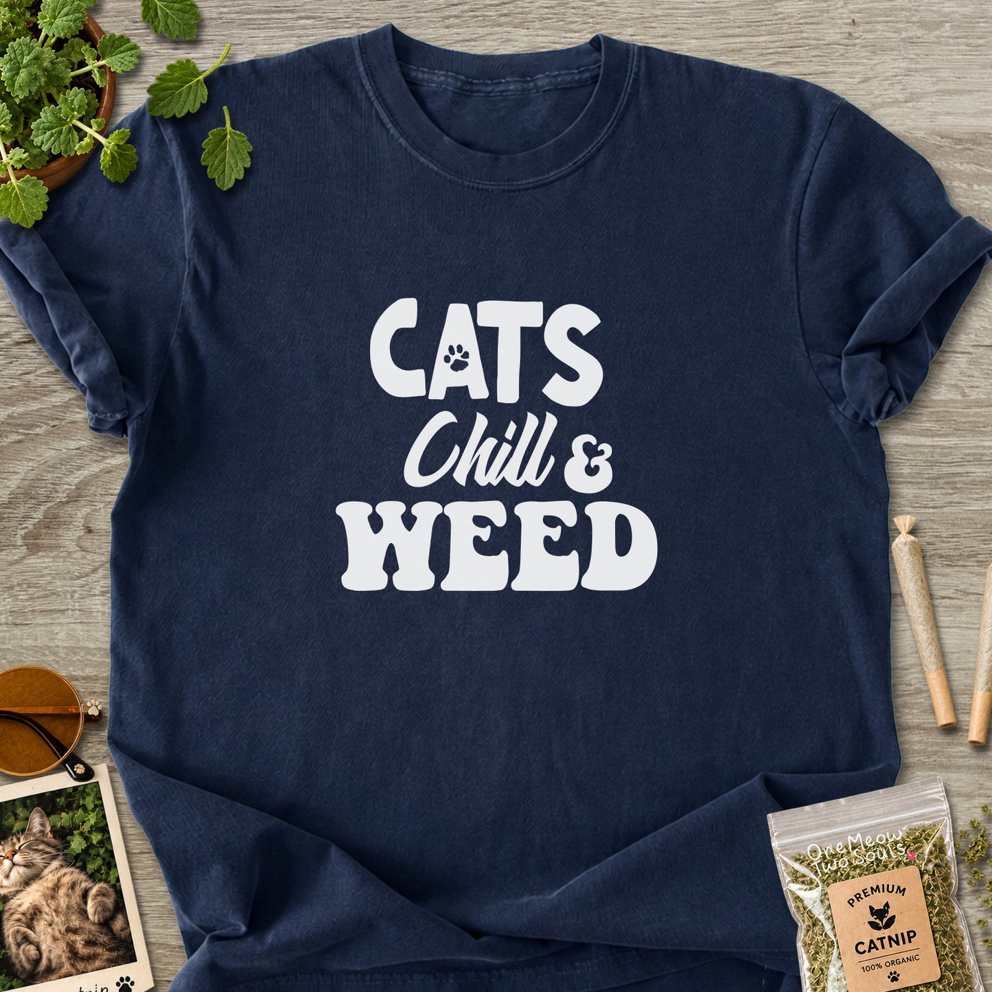 Navy colored Comfort Colors 1717 cotton T-shirt, featuring a "Cats, Chill and Weed" funny cat design illustration. One Meow Two Souls brand.
