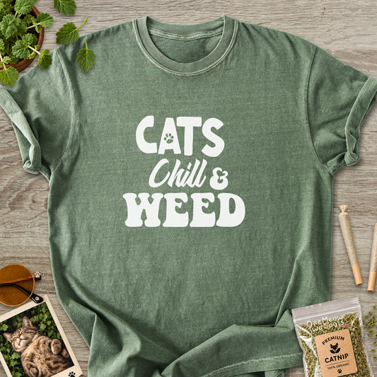 Moss colored Comfort Colors 1717 cotton T-shirt, featuring a "Cats, Chill and Weed" funny cat design illustration. One Meow Two Souls brand.