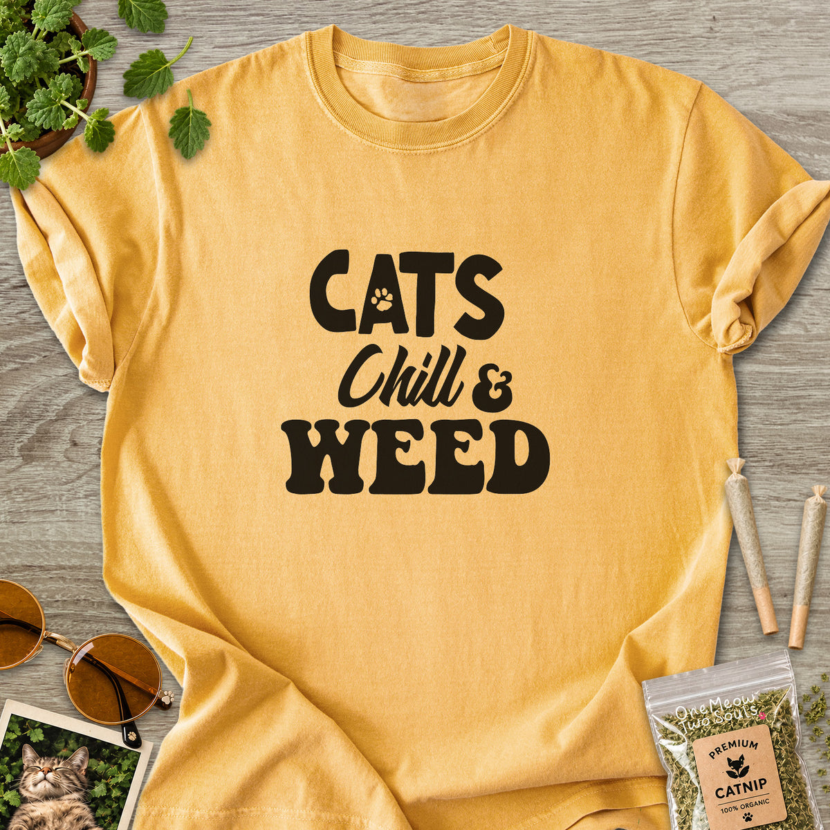 Mustard colored Comfort Colors 1717 cotton T-shirt, featuring a "Cats, Chill and Weed" funny cat design illustration. One Meow Two Souls brand.