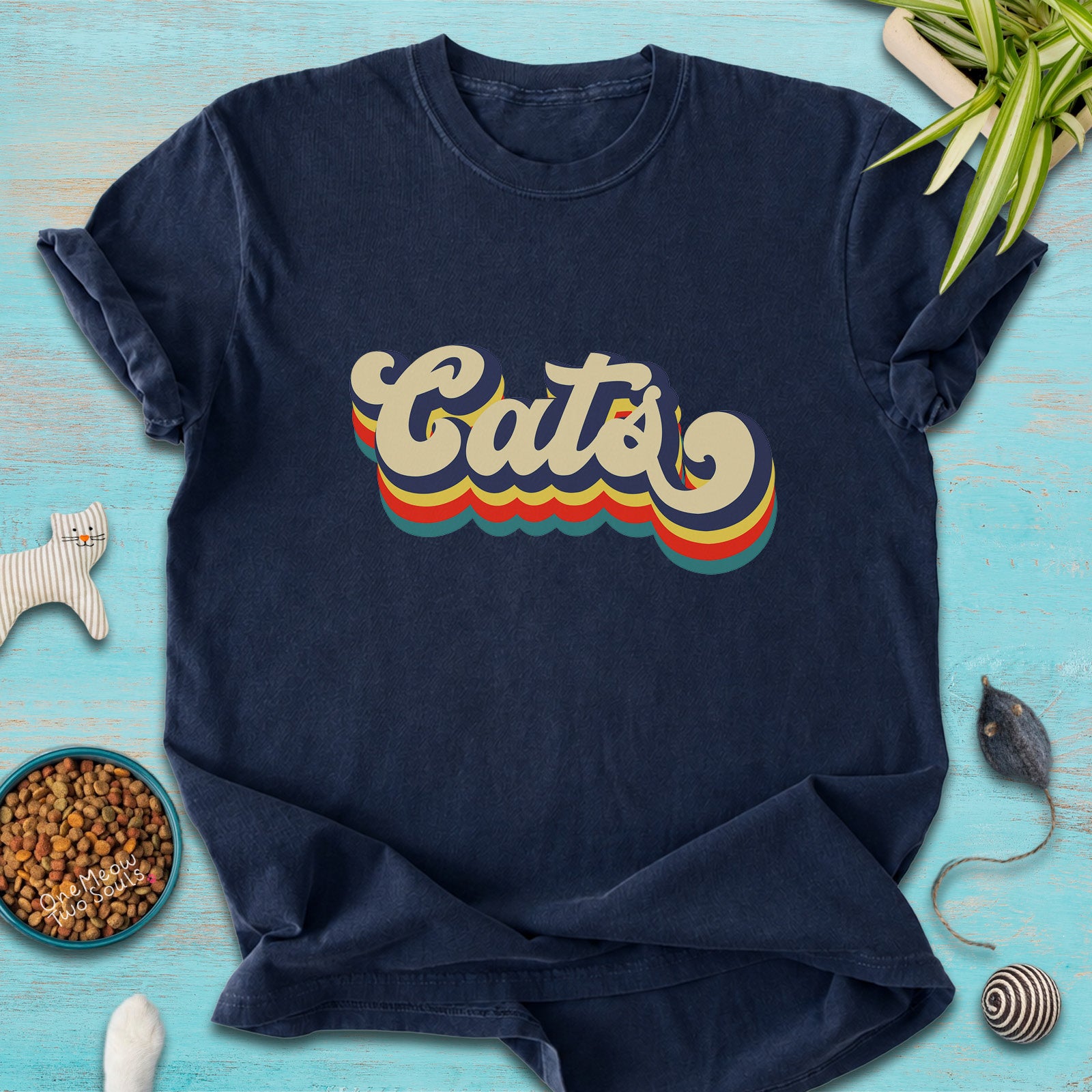 Navy colored Comfort Colors 1717 t-shirt with a retro "Cats" typography design. Onw Meow Two Sould brand.