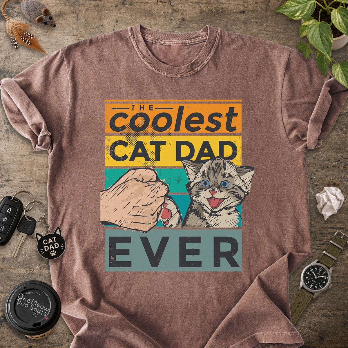 Espresso colored Comfort Colors 1717 T-shirt with a "The Coolest Cat Dad Ever" colorful retro design. One Meow Two Souls brand.