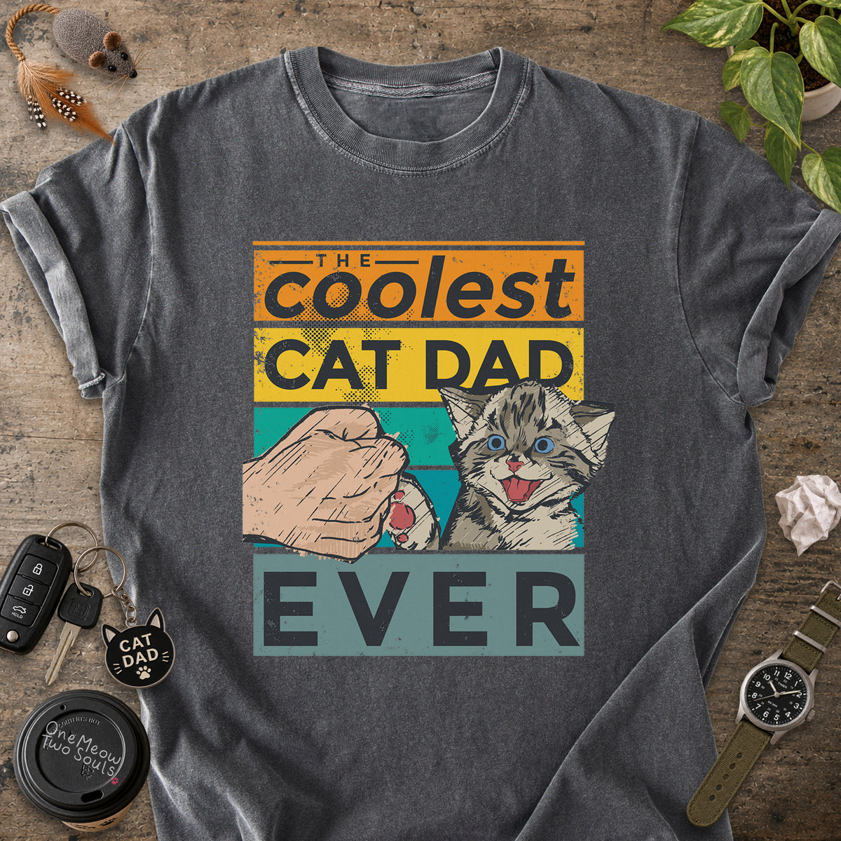 Pepper colored Comfort Colors 1717 T-shirt with a "The Coolest Cat Dad Ever" colorful retro design. One Meow Two Souls brand.