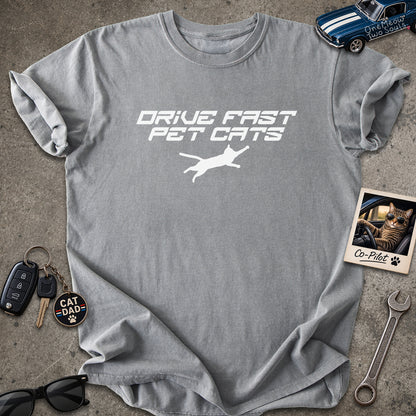 Grey color Comfort Colors 1717 t-shirt with a "Drive Fast Pet Cats" design. Aimed for Cat dads and men who love cats. One Meow Two Souls brand.