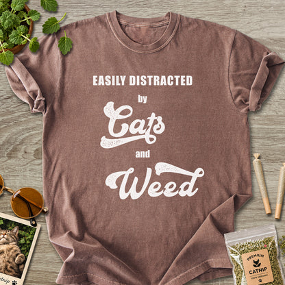 Espresso colored Comfort Colors 1717 cotton T-shirt, featuring a "Easily Distracted by Cats and Weed" funny cat design illustration. One Meow Two Souls brand.