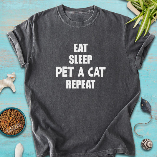 Pepper colored Comfort Colors 1717 t-cotton shirt with a "Eat Sleep Pet a Cat Repeat" design. One Meow Two Souls brand.