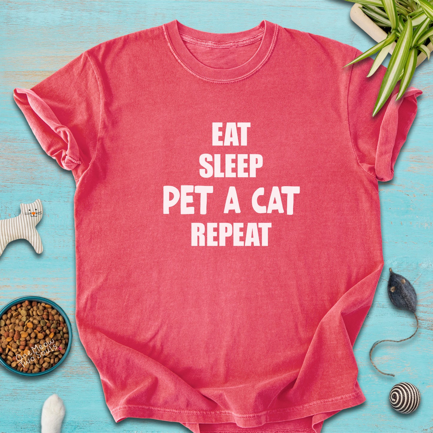 Watermelon colored Comfort Colors 1717 t-cotton shirt with a "Eat Sleep Pet a Cat Repeat" design. One Meow Two Souls brand.
