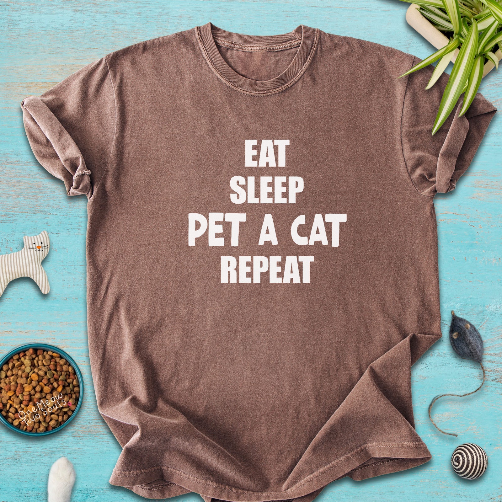 Espresso colored Comfort Colors 1717 t-cotton shirt with a "Eat Sleep Pet a Cat Repeat" design. One Meow Two Souls brand.