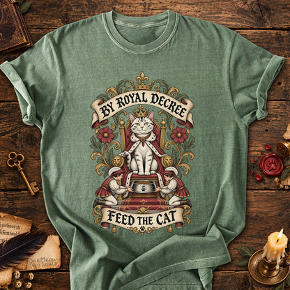 Moss colored Comfort Colors 1717 cotton T-shirt, featuring a "By Royal Decree - Feed The Cat" funny cat design illustration. One Meow Two Souls brand.