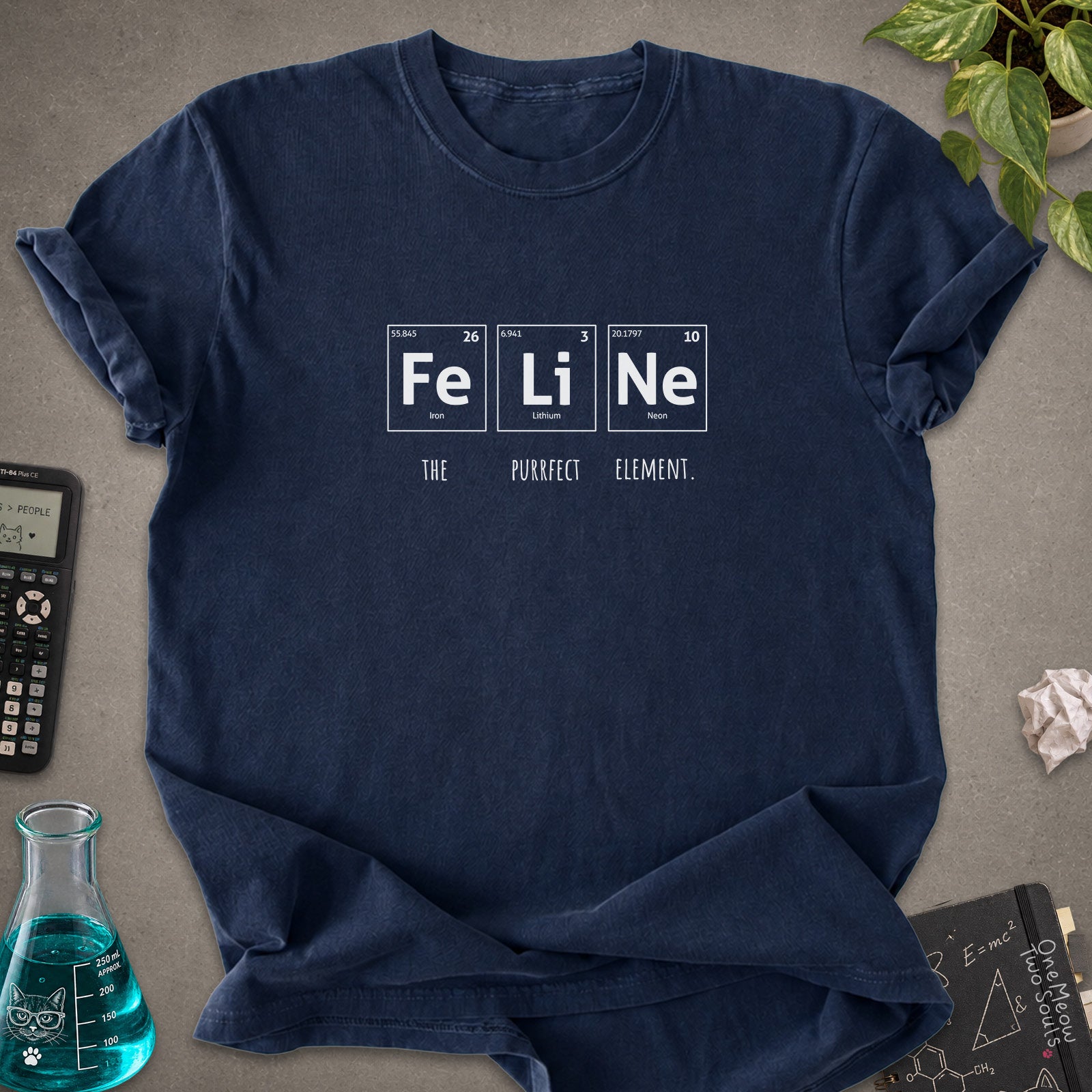 Navy colored Comfort Colors 1717 cotton T-shirt, presenting a "FeLiNe The Purrfect Lelement" funny Chemistry cat design. One Meow Two Souls brand.
