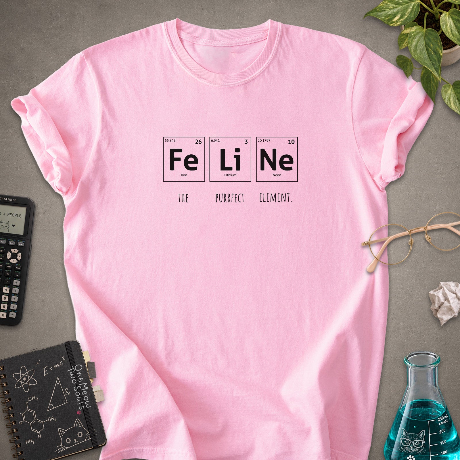 Blossom colored Comfort Colors 1717 cotton T-shirt, presenting a "FeLiNe The Purrfect Lelement" funny Chemistry cat design. One Meow Two Souls brand.