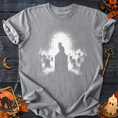 Grey colored Comfort Colors 1717 cotton T-shirt, featuring a spooky graveyard Halloween cat design illustration. One Meow Two Souls brand.